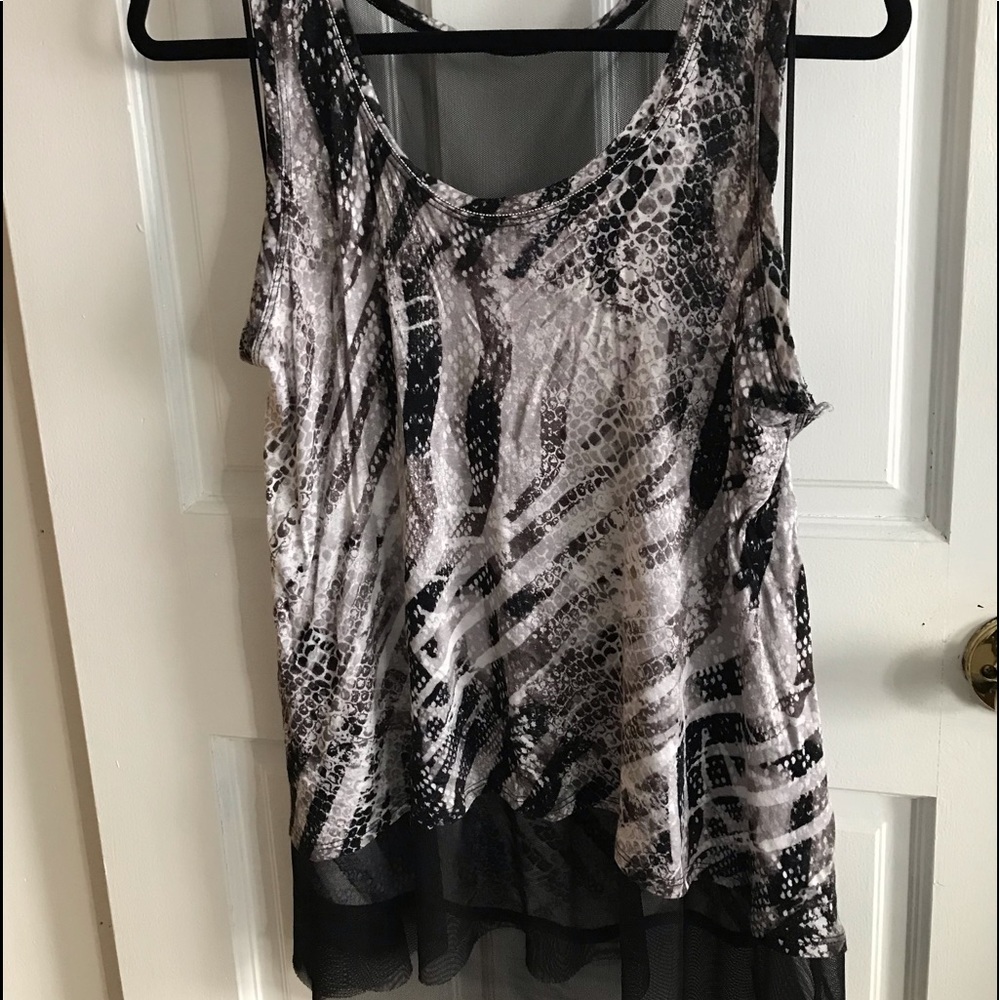 Jennifer Lopez sheer sleeveless shirt